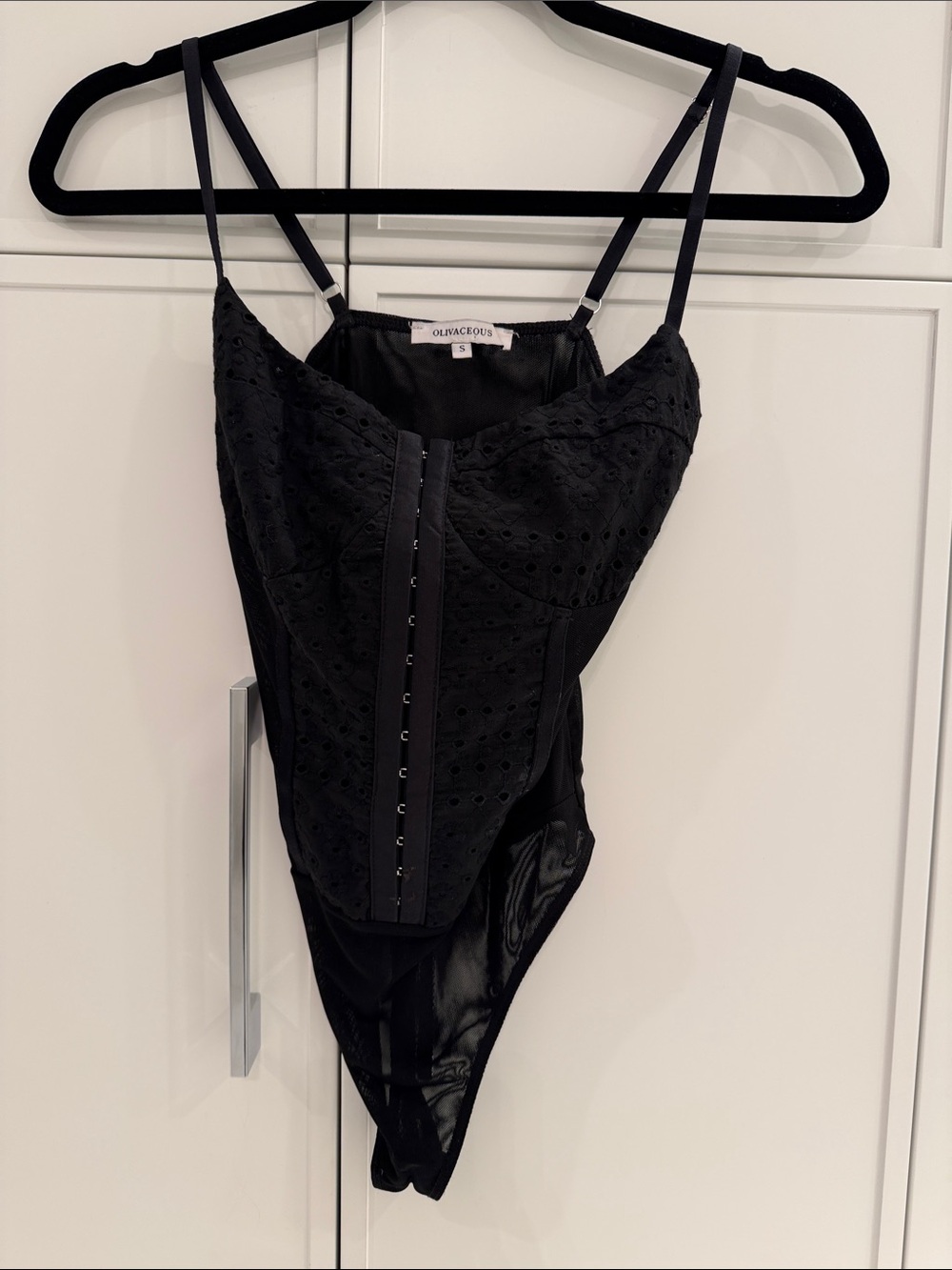 Olivaceous Black Eyelet Corset Bodysuit. Size S. Hook and eye closure up front.